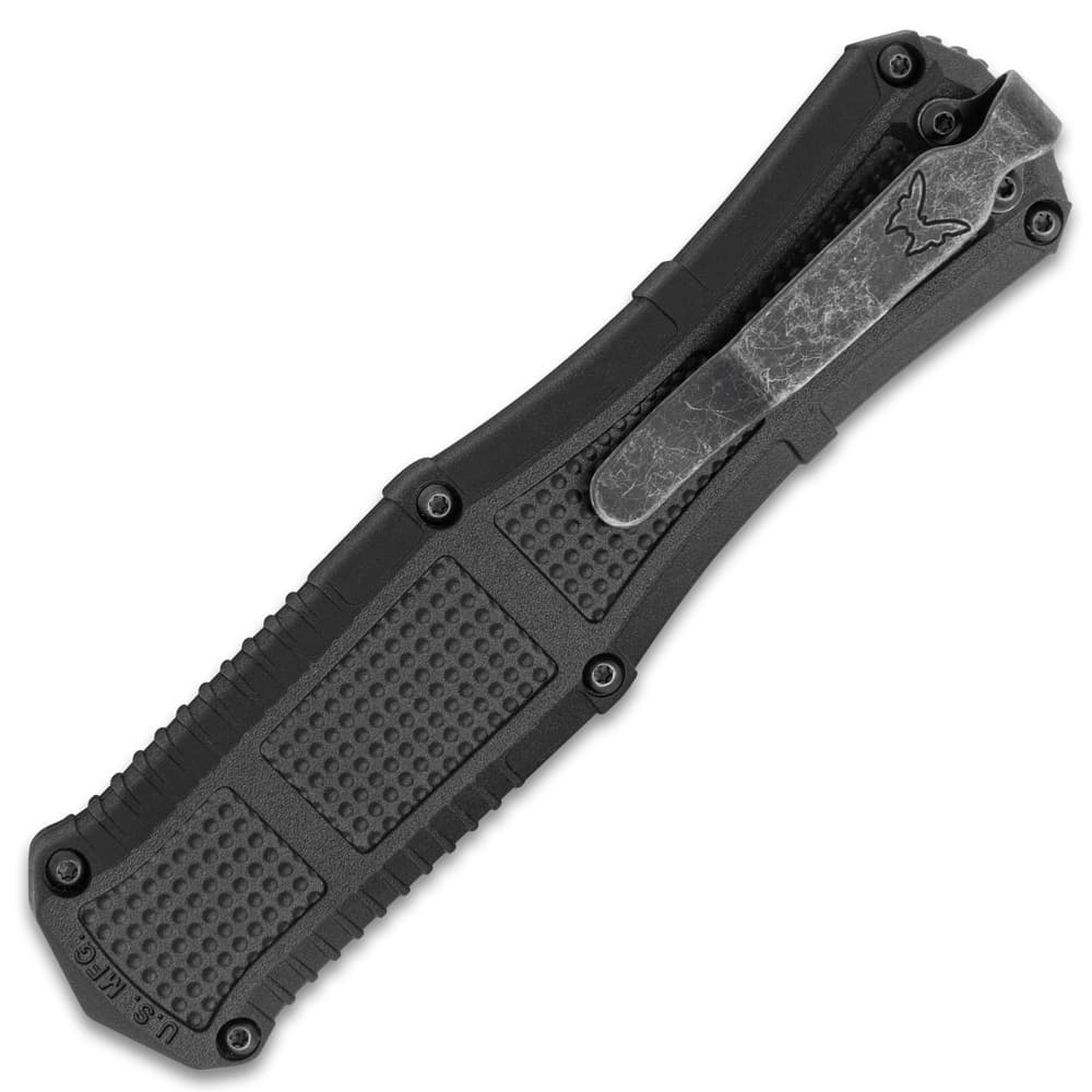 Angled image of the handle and deep carry clip on the OTF Knife. image number 2