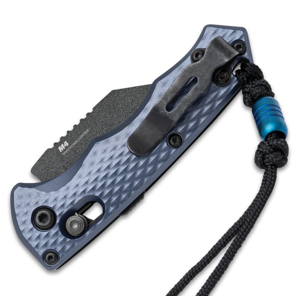 Shown closed, the Benchmade Partial Immunity Automatic Knife has a black pocket clip on the back of the grey handle and black lanyard. image number 2