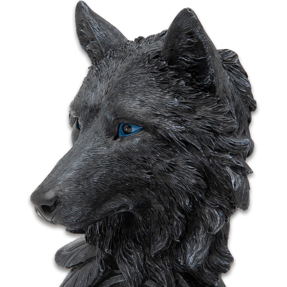 This iamge shows the intricate details of the the fur and whiskers on the face of this black wolf desk clock. image number 2