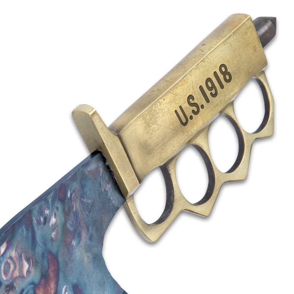 Angled view of the solid brass knuckle guard handle with antiqued finish and “U.S. 1918” deep stamped into it. image number 1