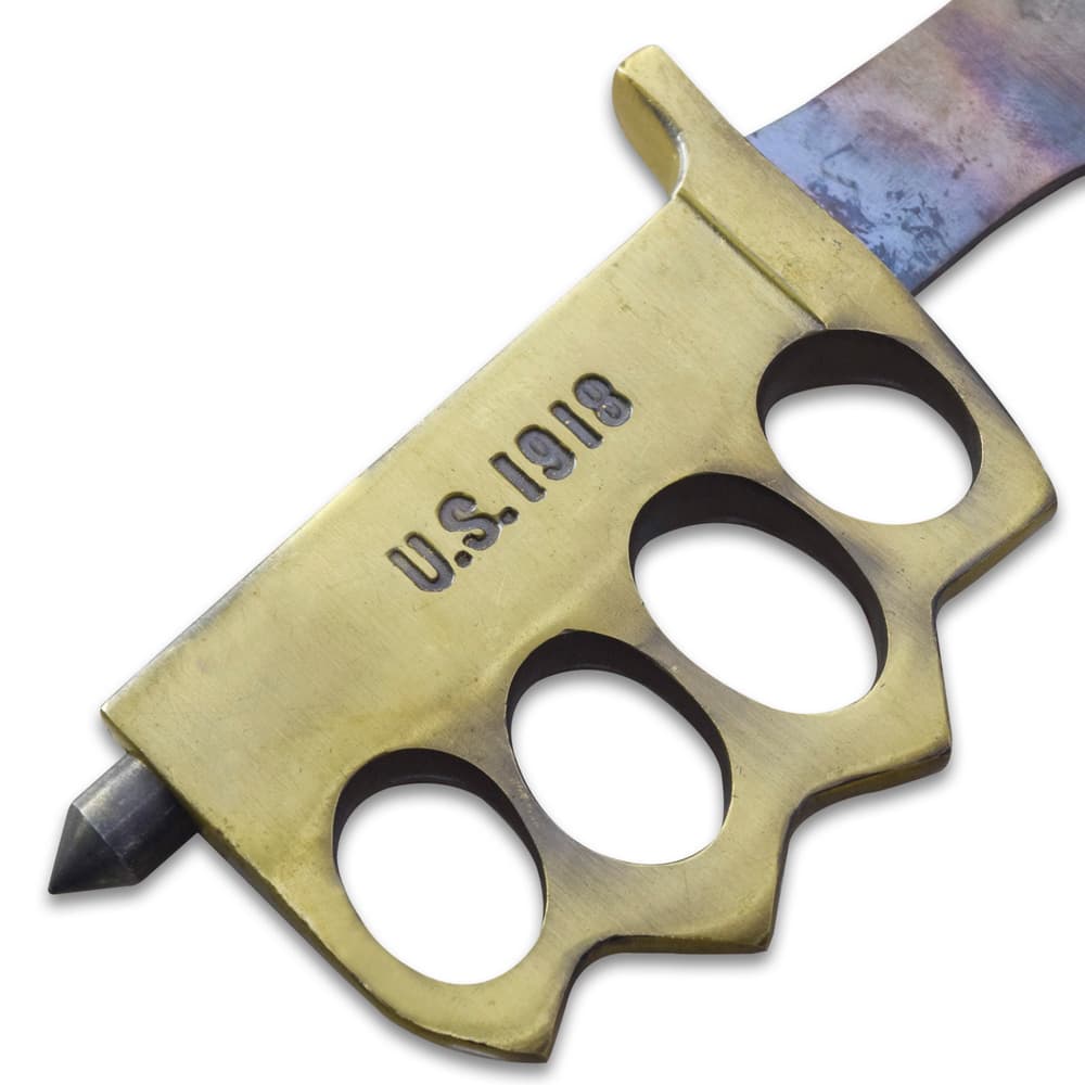 Detailed view of the solid brass knuckle guard handle with an antiqued finish and “US 1918” stamped into it. image number 2
