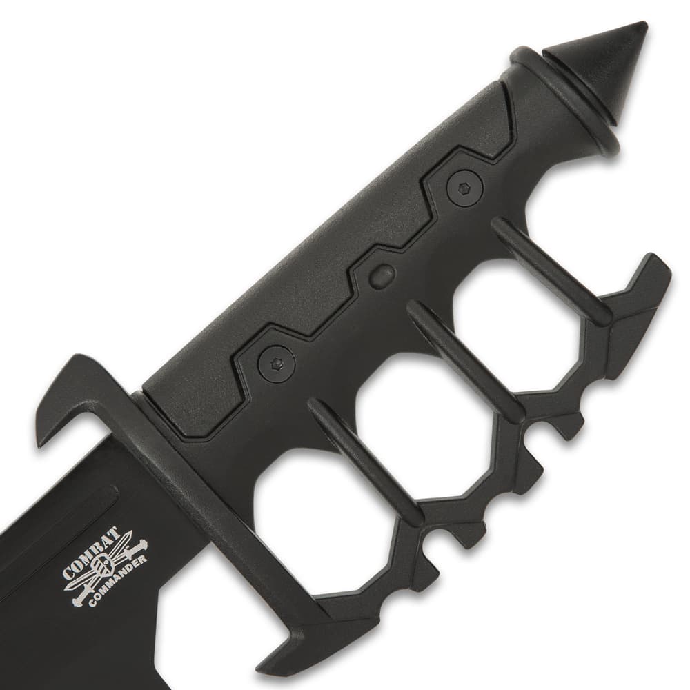 The trench knife handle is of cast metal with black, no-slip rubberized grip inserts and it features a skull crusher pommel image number 2