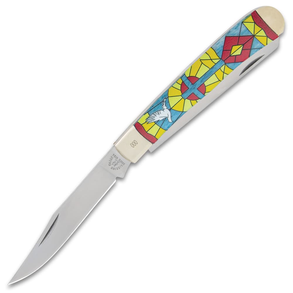 The pocket knife has a stainless steel clip point blade that's razor-sharp. image number 2