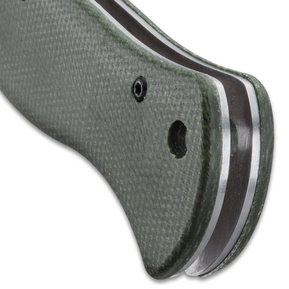 The Bushmaster Explorer Micarta Pocket Knife has stainless steel liners. image number 2
