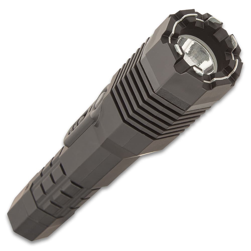 The stun gun has an engineering ABS construction with an anti-grip rubber coating and a ridged grip and wrist lanyard image number 2
