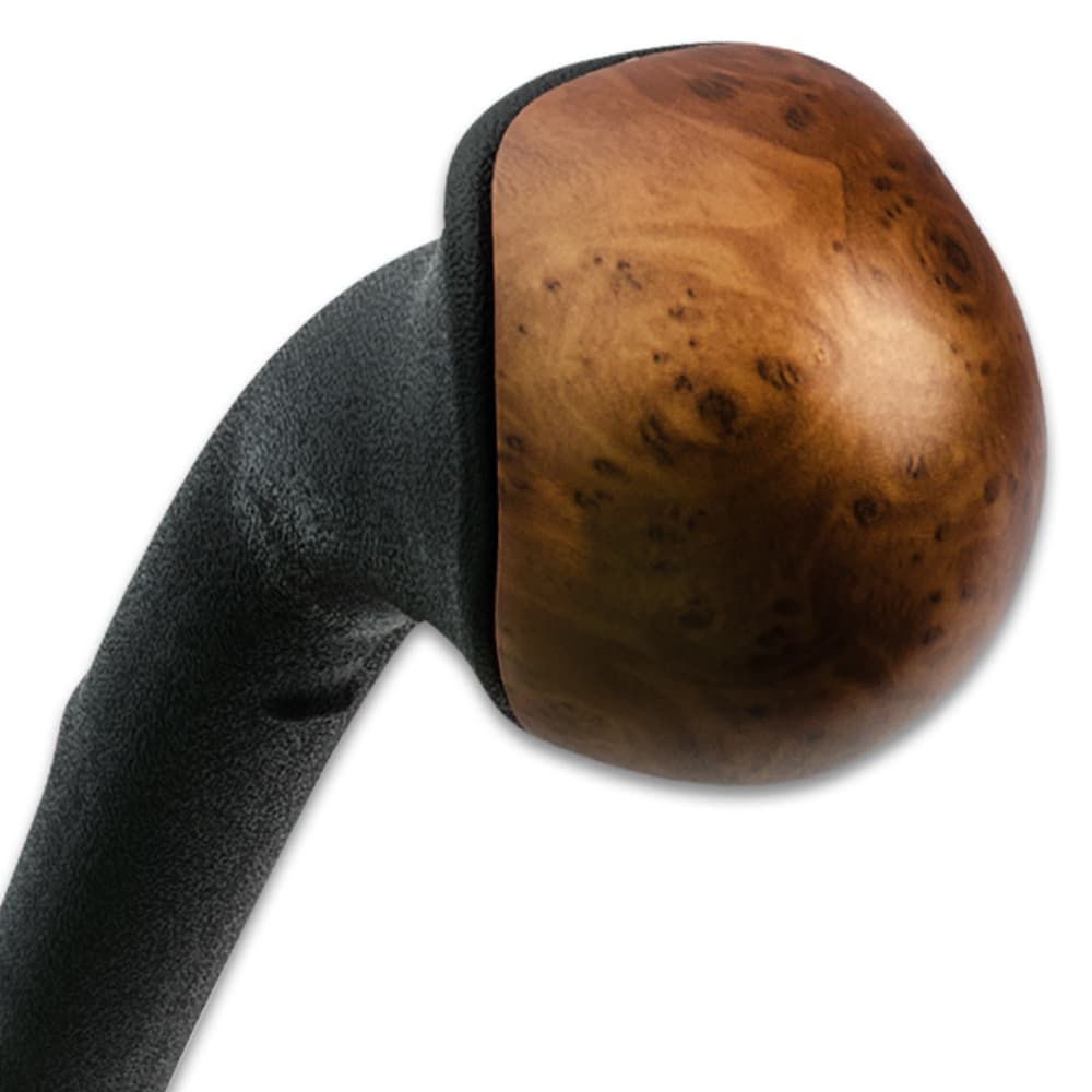 Zoomed view of the faux wood cap of the shillelagh. image number 2