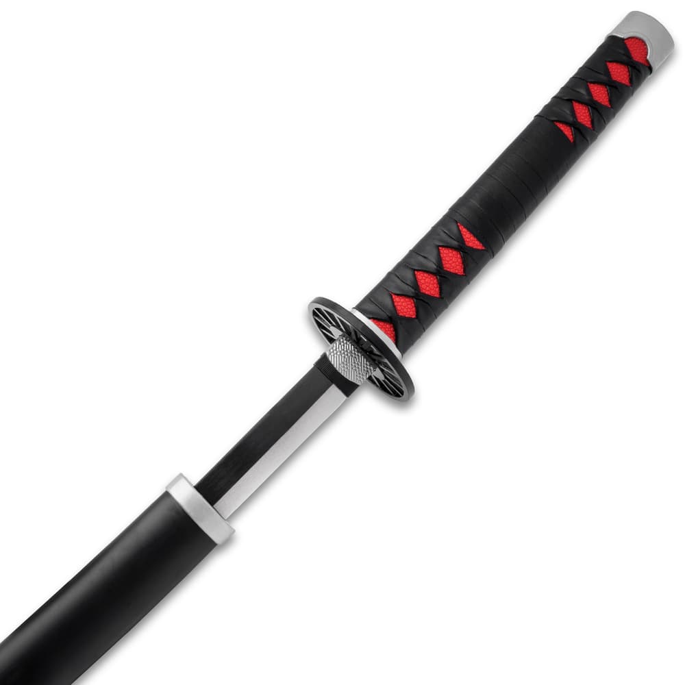 The red faux ray skin handle with black wrapping is shown in full as the blade slides into the sword’s scabbard. image number 2