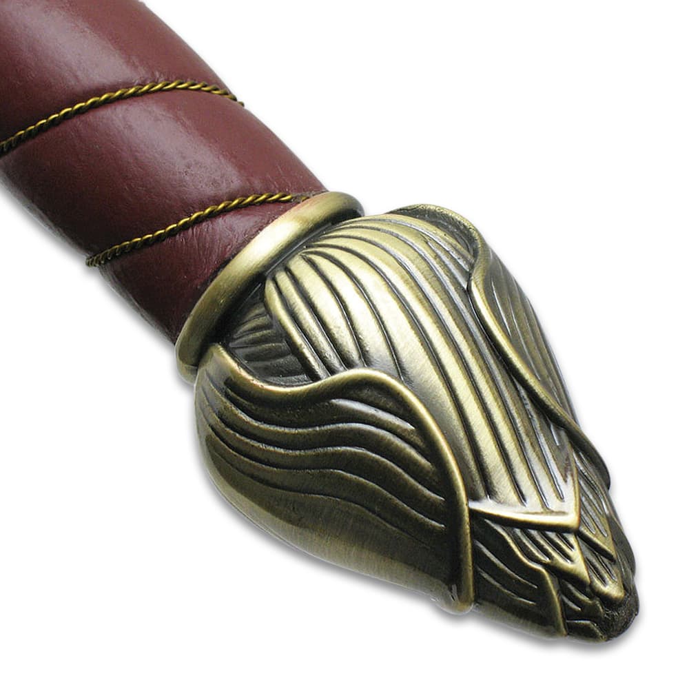 A detailed view of the sword's pommel image number 2