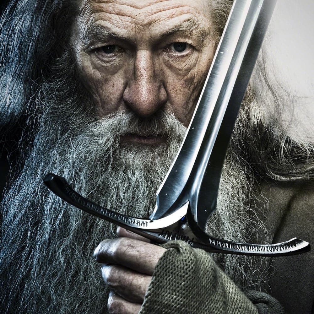 The Hobbit character Gandalf holding the Glamdring sword. image number 2