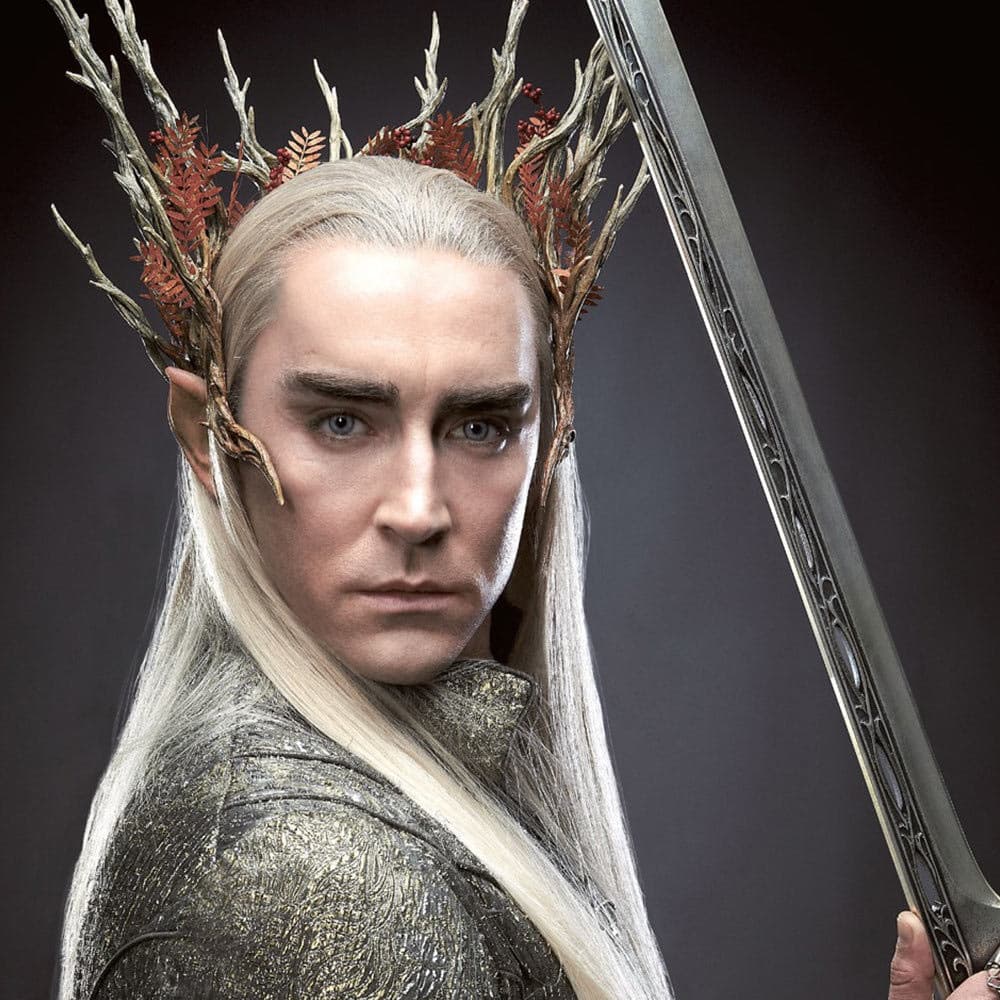 The Hobbit character Thranduil is shown holding the sword. image number 2