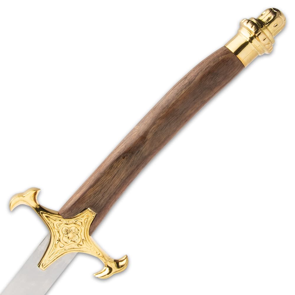 Zoomed view of the shamshir’s brass plated guard and pommel with hardwood handle. image number 2