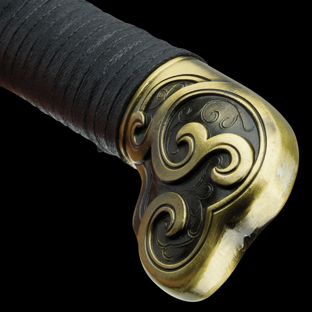 The handle is wood wrapped in black nylon cord and it features an elaborately designed, antiqued metal alloy pommel image number 2