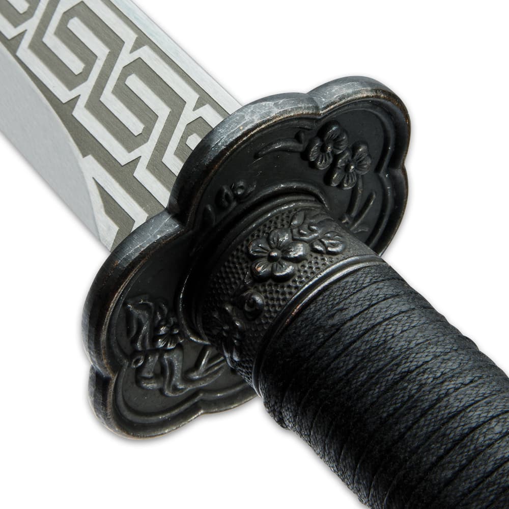 The sword has a 29” high-quality manganese blade that is razor-sharp and it extends from a crafted, metal tsuba image number 2