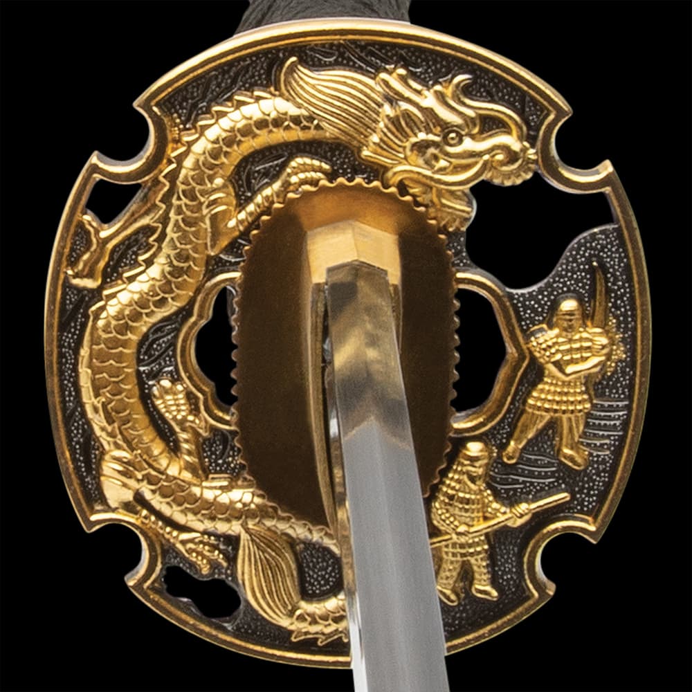 The hardwood handle is wrapped in genuine, white rayskin and black cord and the tsuba is metal alloy in a golden dragon design image number 2