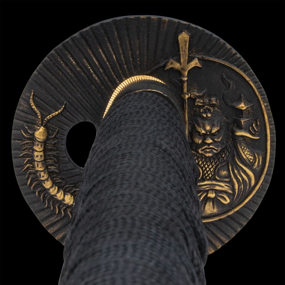 It has an antiqued brass, round tsuba with an intricately detailed demon monk and centipede design image number 2