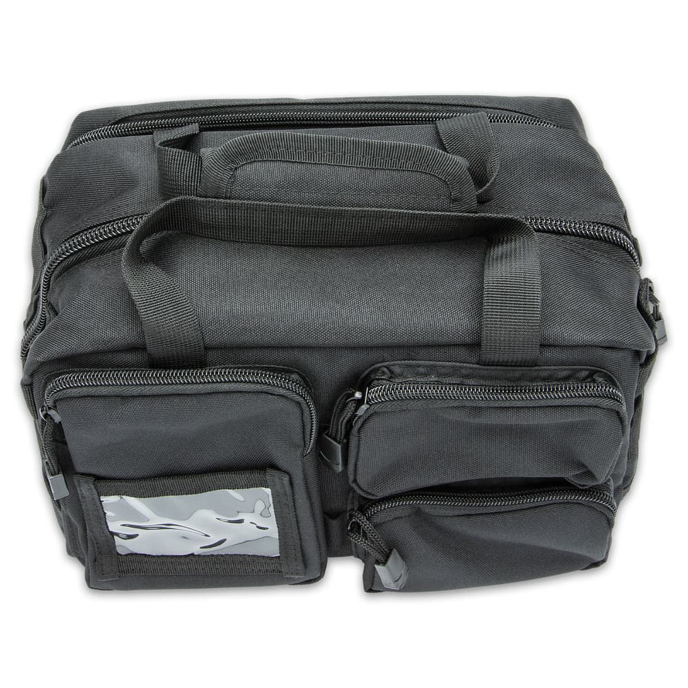 Made with tough Denier polyester, the bag is MOLLE compatible with loops on the back and sides and a carry handle image number 2