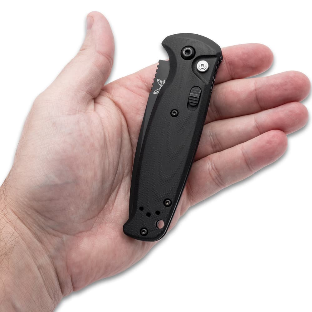 The automatic pocket knife is 4 2/5” when closed. image number 3