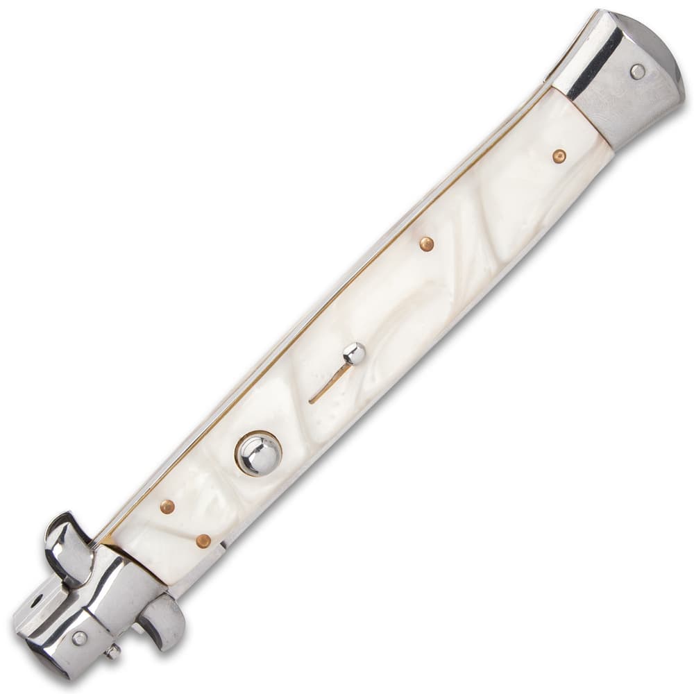 The 7 1/4” closed pocket knife has faux pearl handle scales, and the push button and slide lock are conveniently on top image number 3
