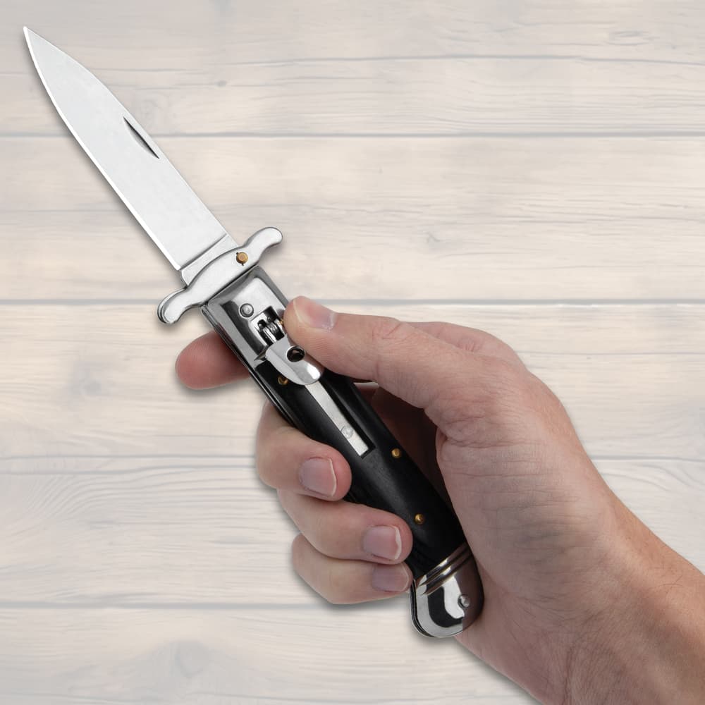 The Blackwood Automatic Stiletto Knife shown in hand for size reference image number 3