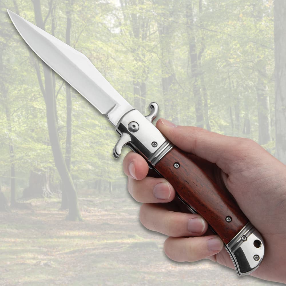 The Pakkawood Automatic Knife displayed in hand for size reference image number 3