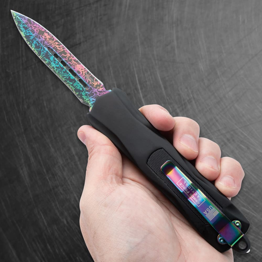 Full image of the OTF Knife being held in hand. image number 3
