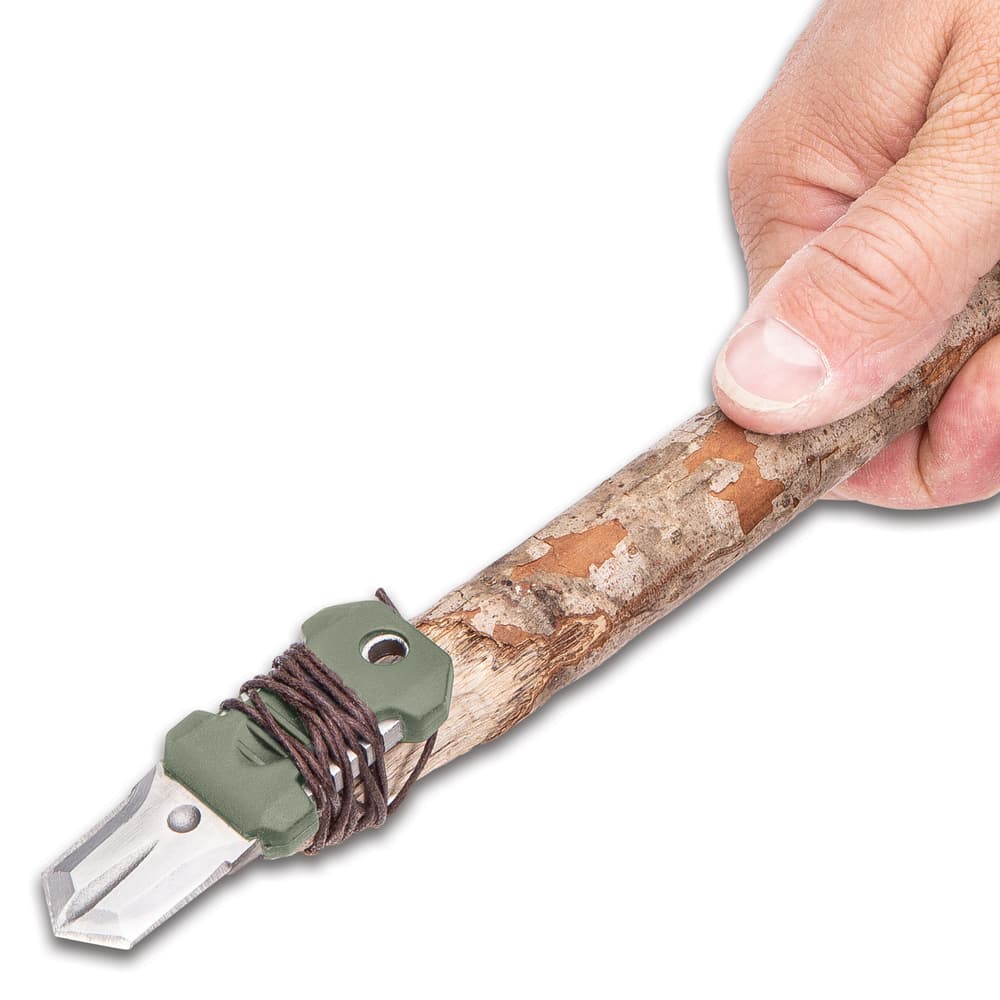 SHTF Tactical Molle Shiv secured to a stick using the included brown lanyard cord. image number 3