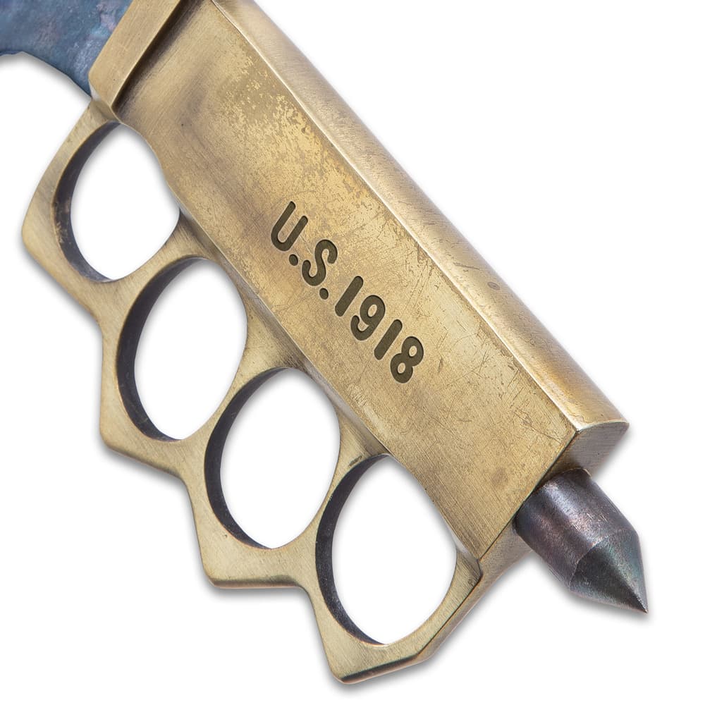 Another view of the “U.S. 1918” stamp on the side of the solid brass knuckle handguard with skull crusher pommel. image number 2