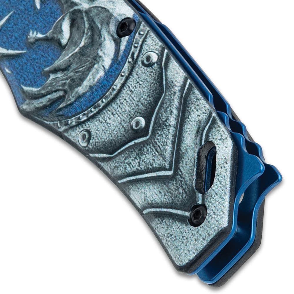 This image shows a close up of the artwork on the witcher pocket knife. image number 3