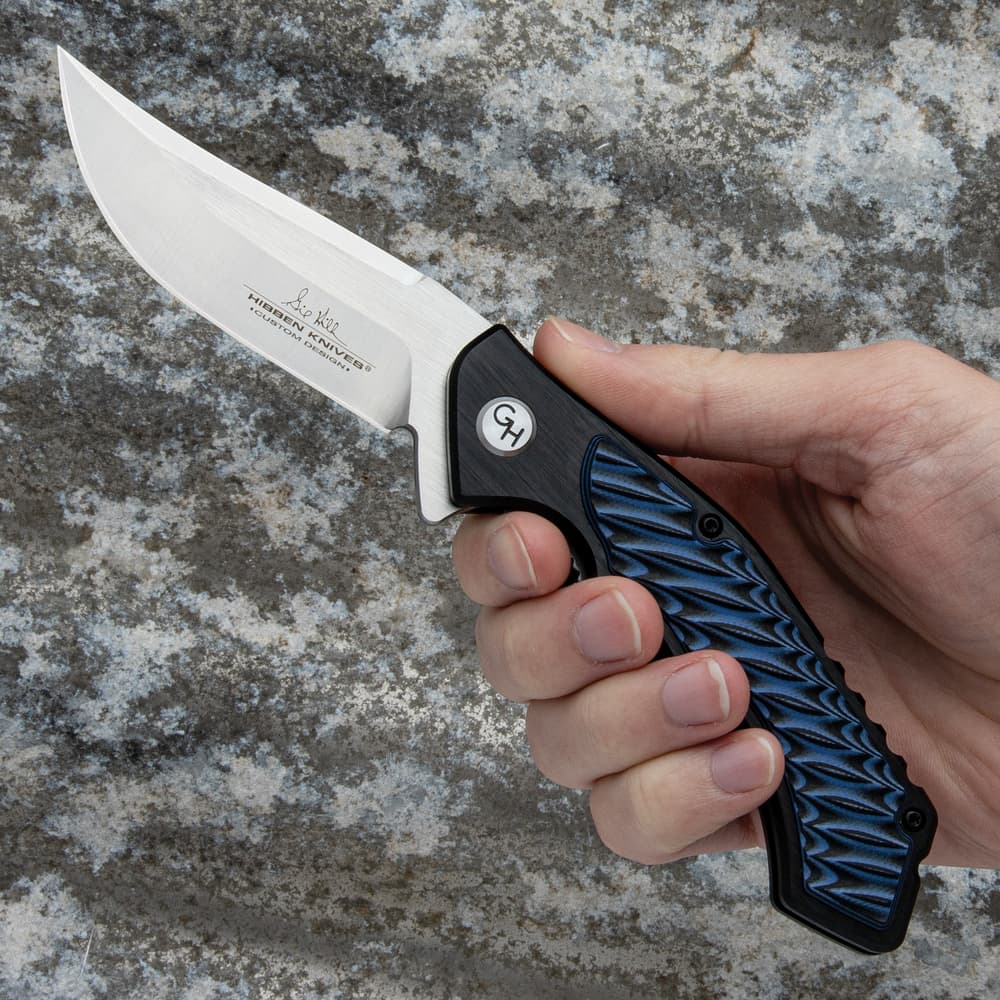 The Hibben pocket knife has a 7Cr17 stainless steel blade image number 3