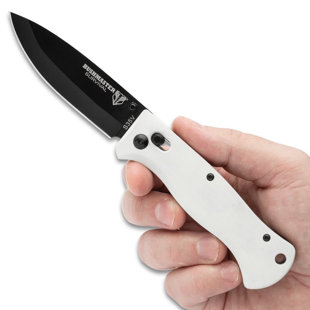 Full image of the Titanium Voyager Pocket Knife opened held in hand. image number 3