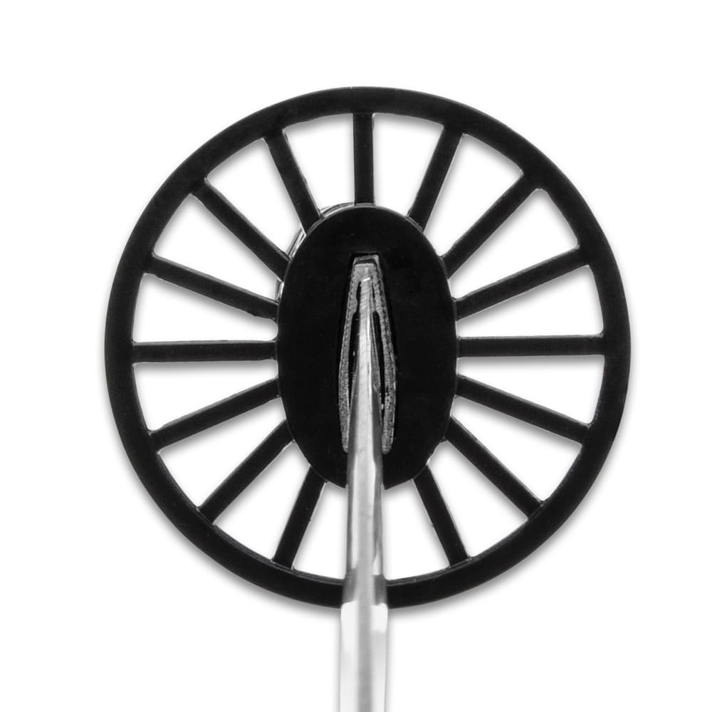 Detailed view of the black wagon wheel shaped metal tsuba. image number 3