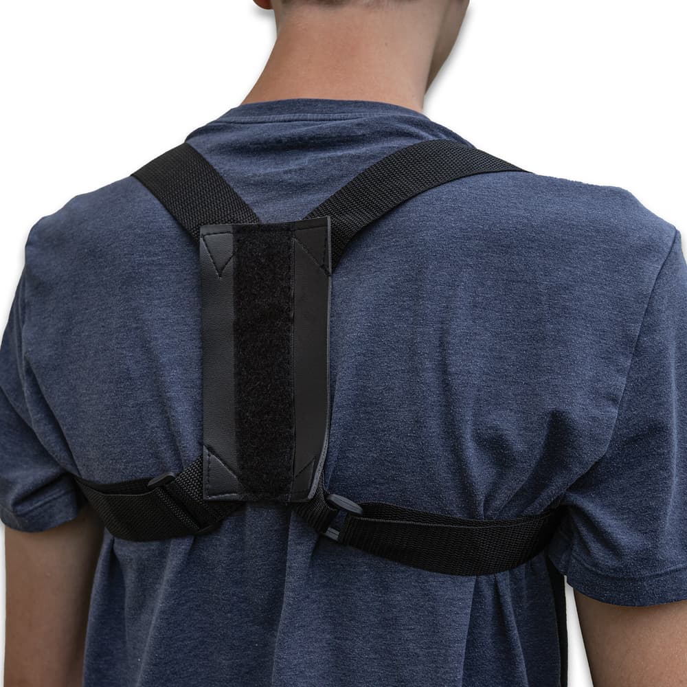 A view of the shoulder harness for carrying the sword image number 3