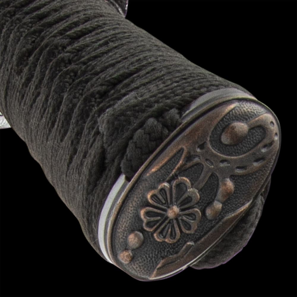 The hardwood handle is wrapped in genuine, white rayskin and black cord and the tsuba is metal alloy in a golden dragon design image number 3