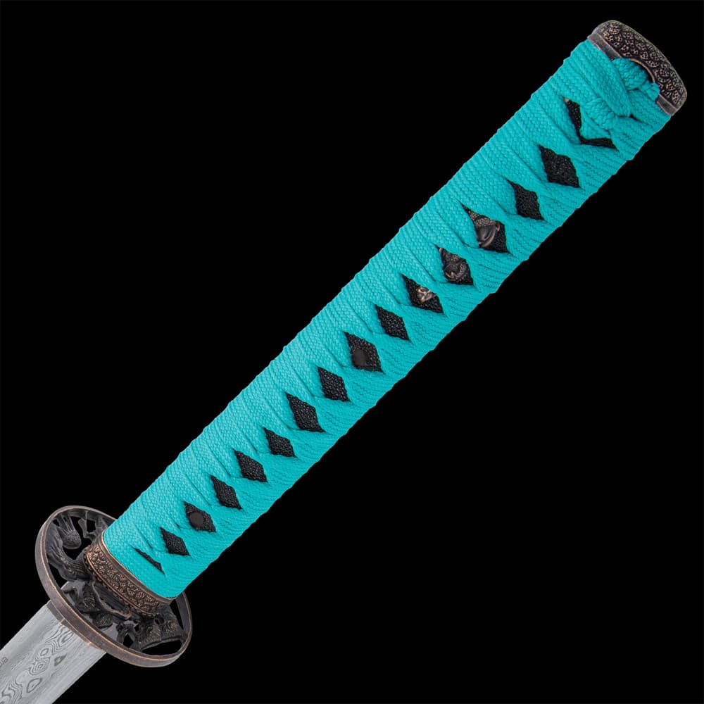 The hardwood handle is faux ray skin wrapped with teal blue cord. image number 3