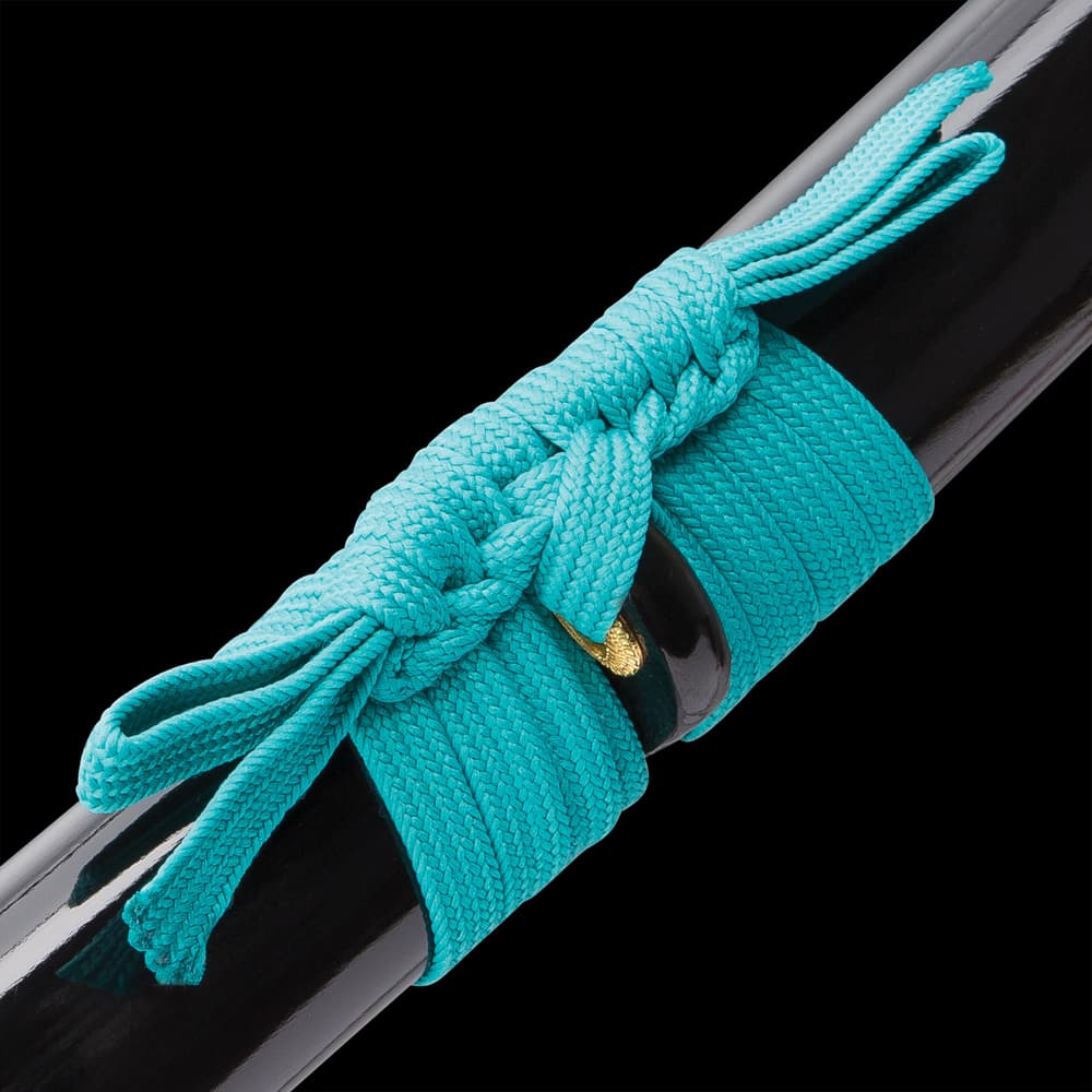The scabbard has a teal braided nylon hanging cord. image number 3