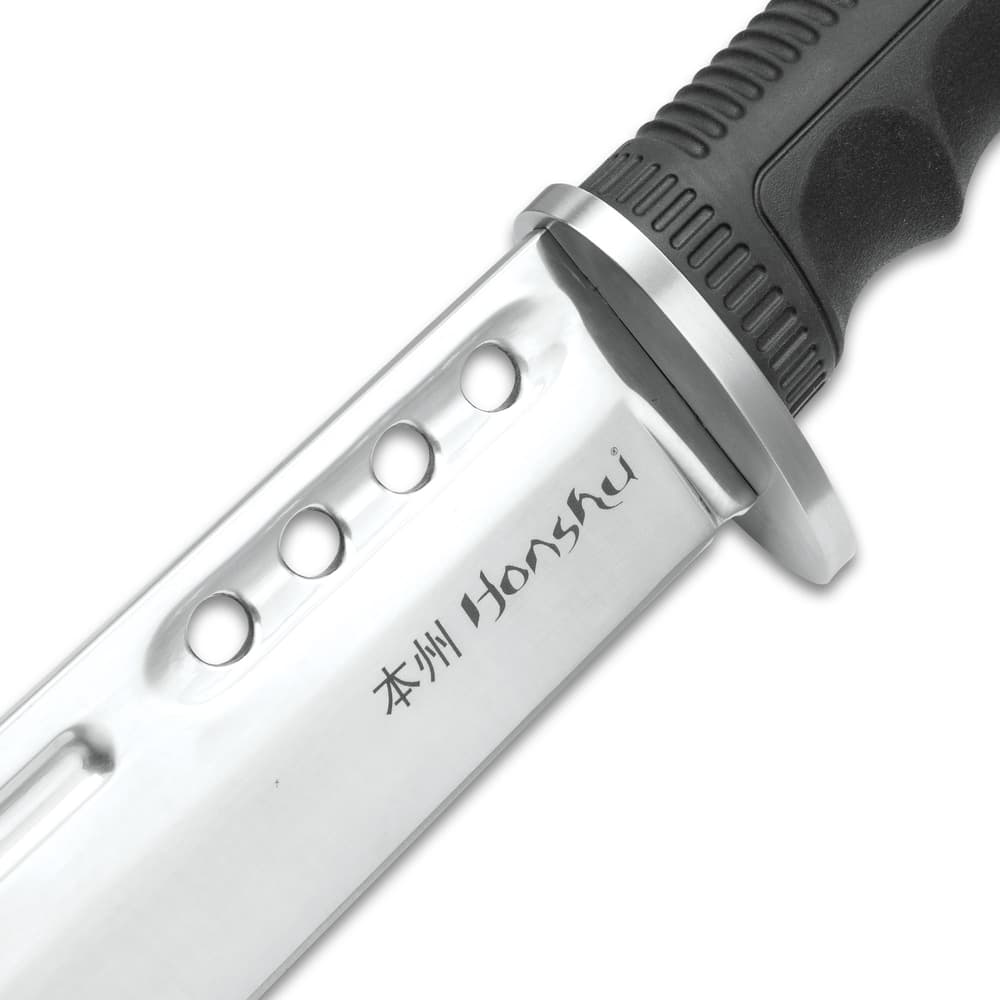 Close view of stainless handguard extended to the carbon steel blade with Honshu etched on the inner facing of the sword image number 3