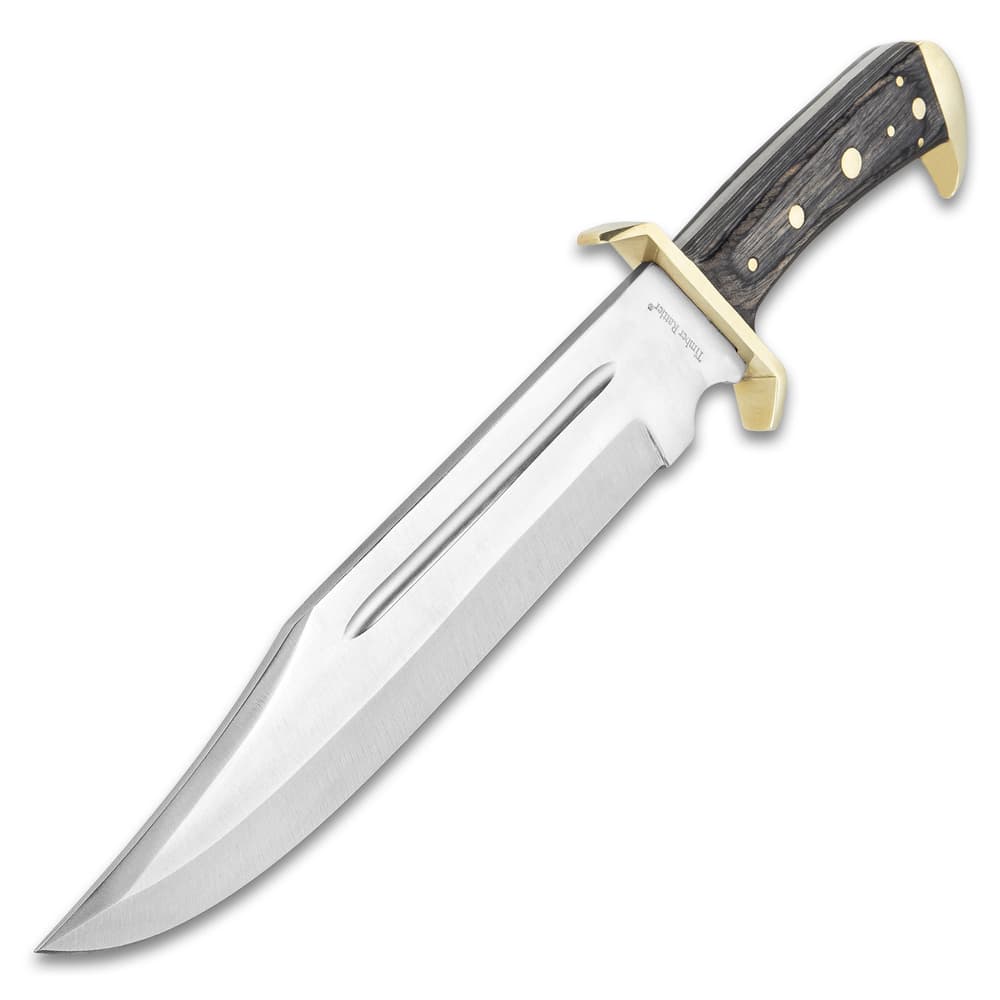 The knife has a 11 3/8” stainless steel blade extending from the brass-plated guard. image number 4