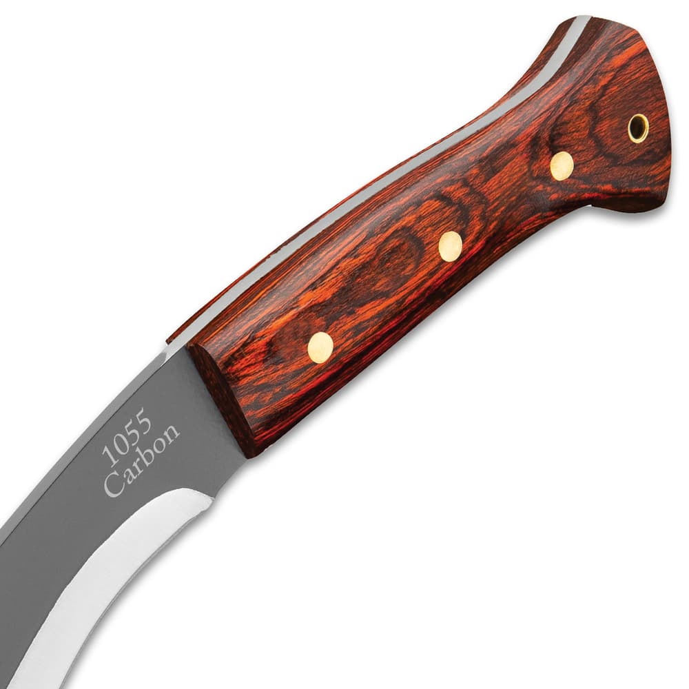 The 1055 carbon steel blade extends from the dark wooden handle scales. image number 4