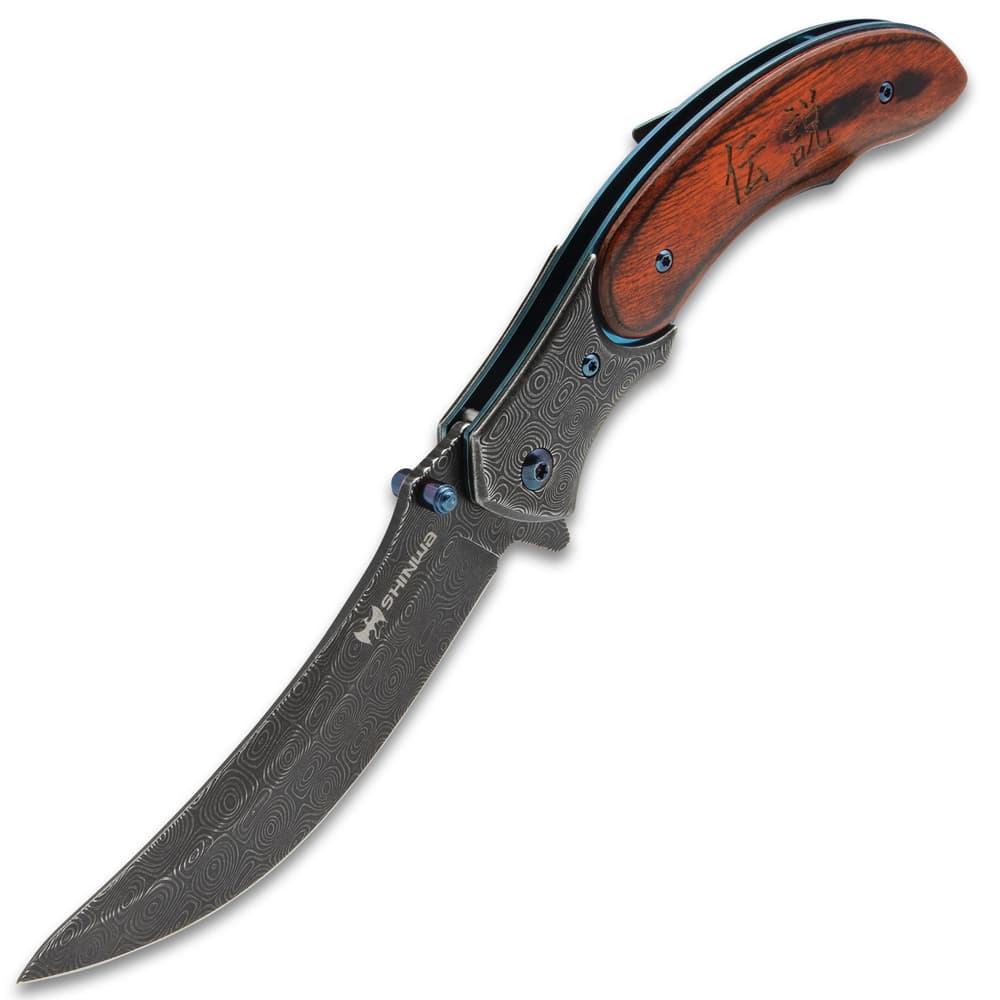 Open shinwa shinigami bloodwood pocket knife with raindrop pattern blade, metallic blue accents, and engraved bloodwood handle scales. image number 4
