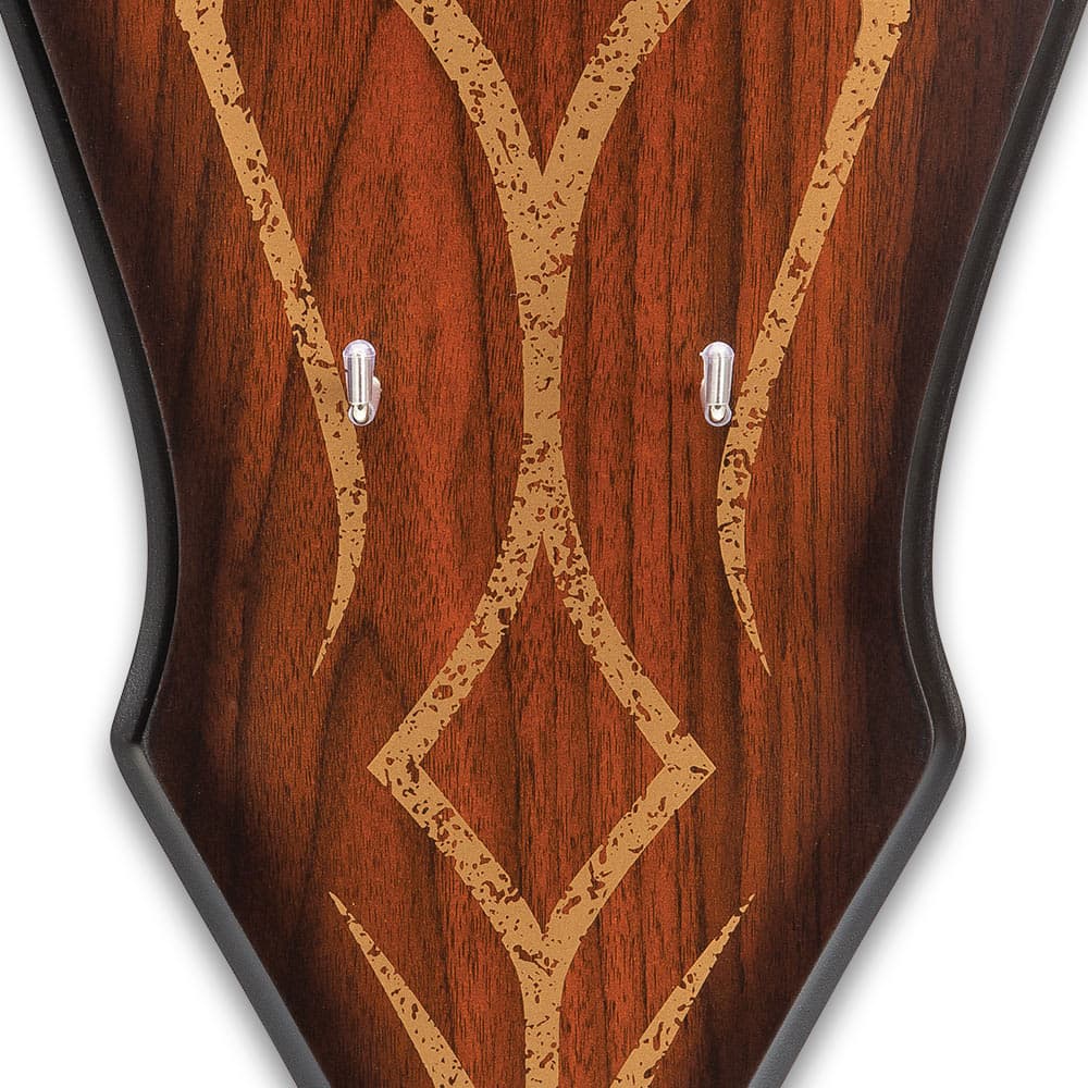 A zoomed in view of the wood grain finish wall display plaque with silkscreen design. image number 4