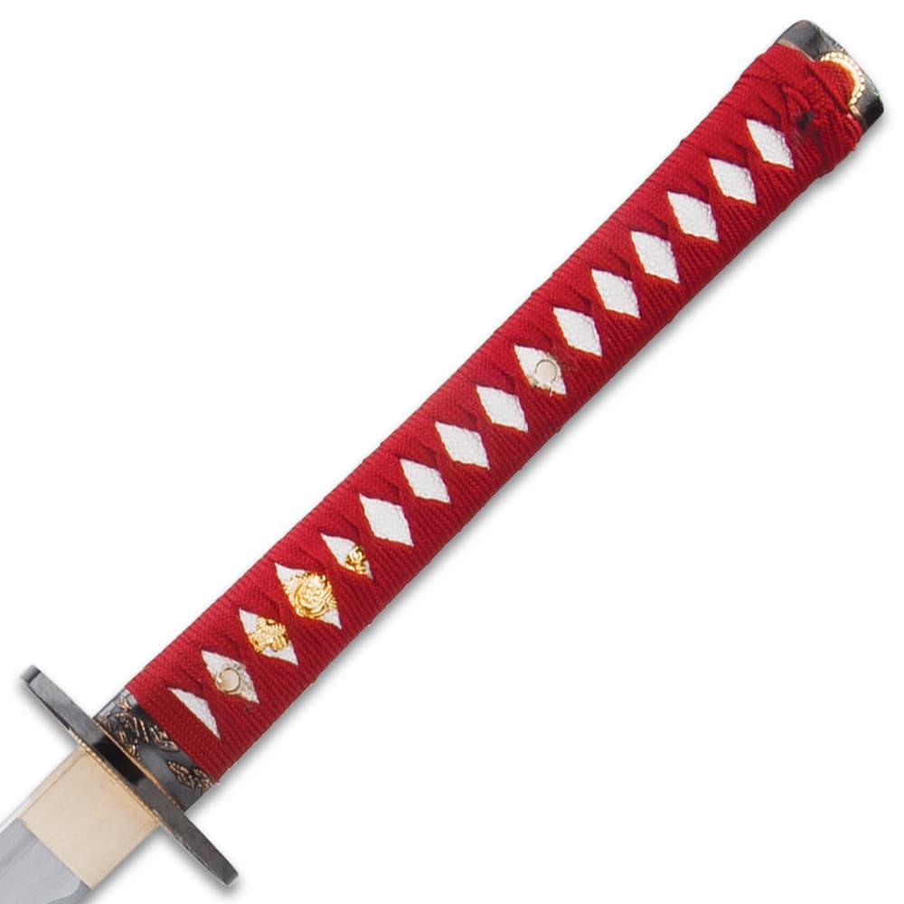 The hardwood handle is traditionally wrapped in faux rayskin and red cord and has an intricately detailed metal tsuba image number 4