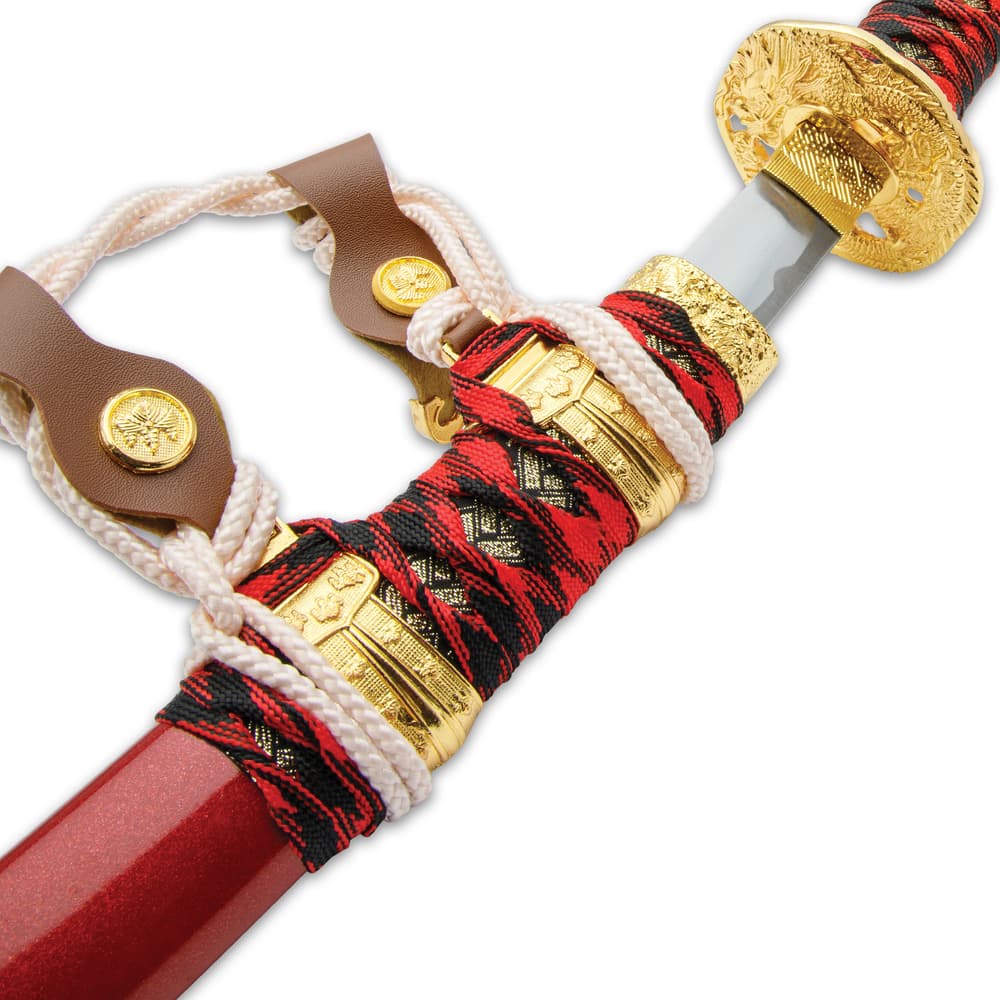 The red wooden scabbards have gold-painted artwork, and each has a white cord and faux leather sword hanger image number 4