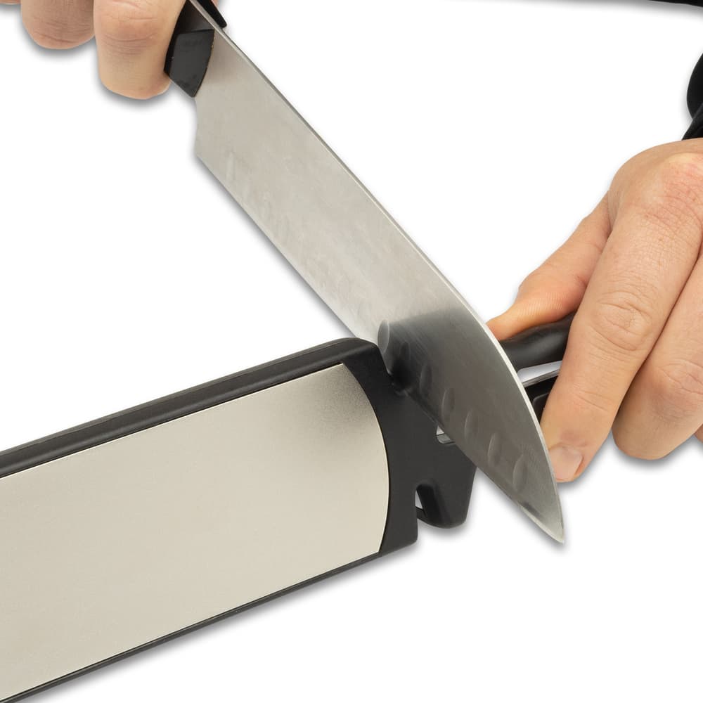 Sharpening a knife with the Max Edge Sharpener image number 5