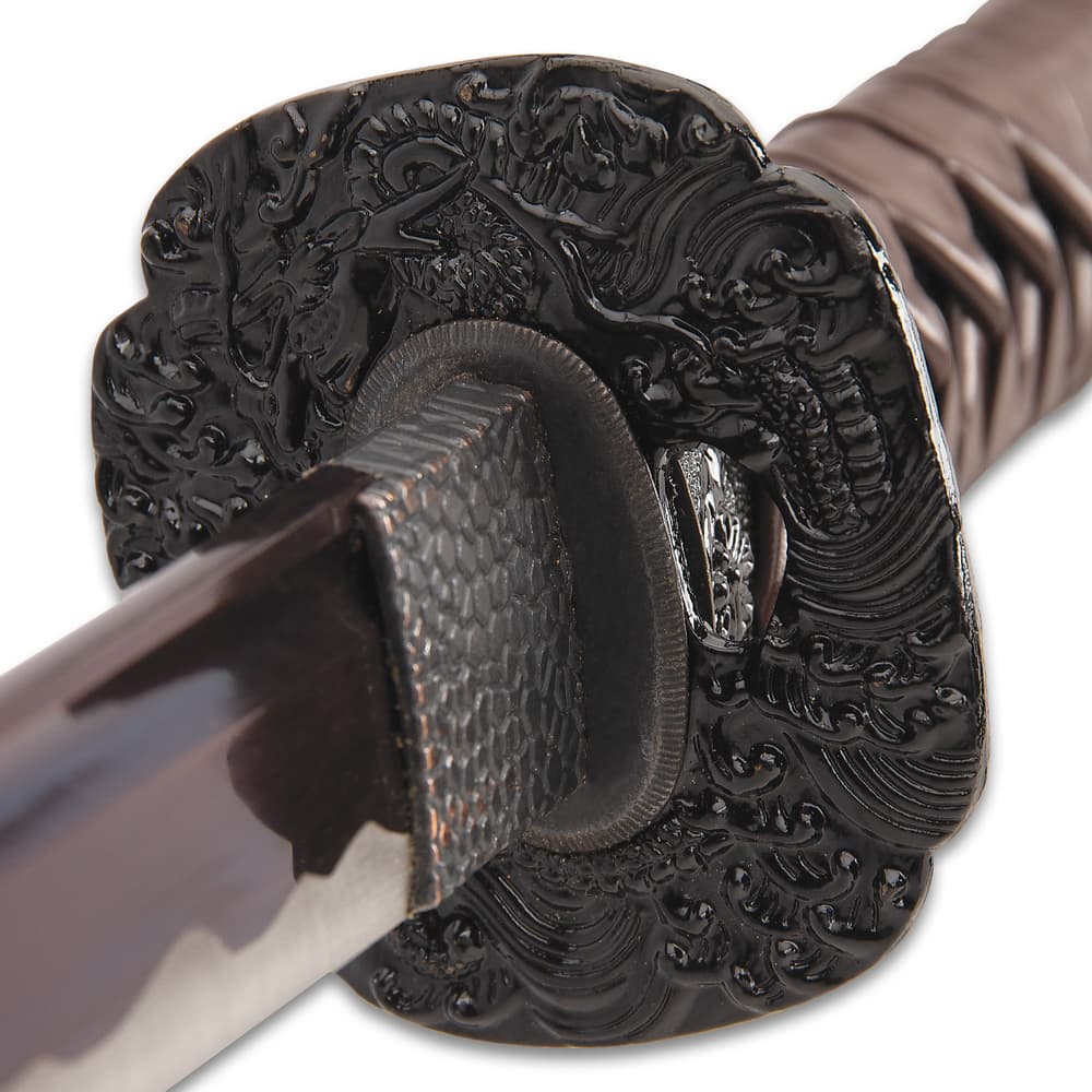 The dark metal alloy habaki has a reptile pattern and the dark metal alloy tsuba has an intricate Wind Dragon design image number 5