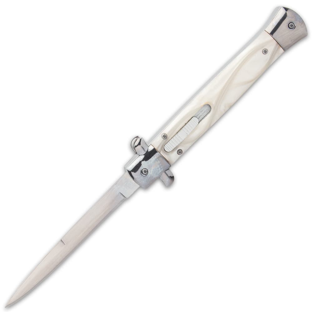Pearl handled switchblade stilleto knife with silver mirror polished 4 3/4" blade. image number 6