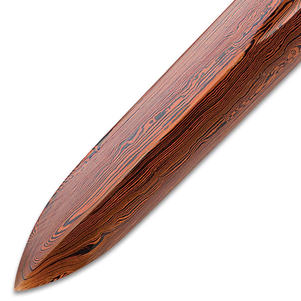 The black Damascus steel blade shown in detail with distinct color pattern. image number 6