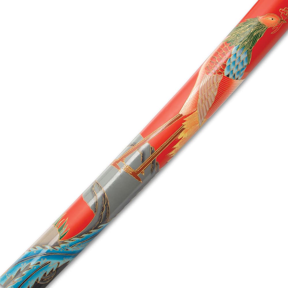 Detailed look at the colorful crane artwork on the side of the wooden scabbard. image number 7