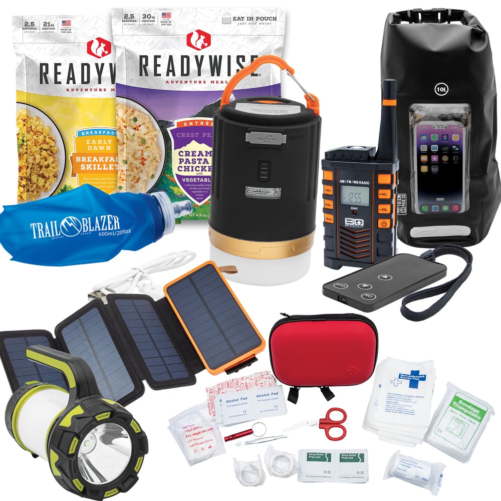 Camping gear including food, lantern, radio, and first aid kit image number 0