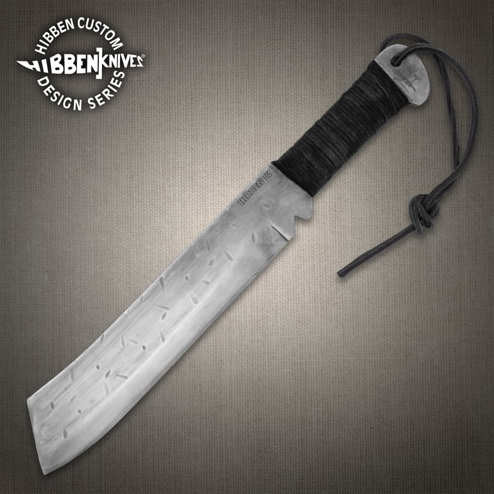 Large machete with a wrapped handle and engraved blade image number 0