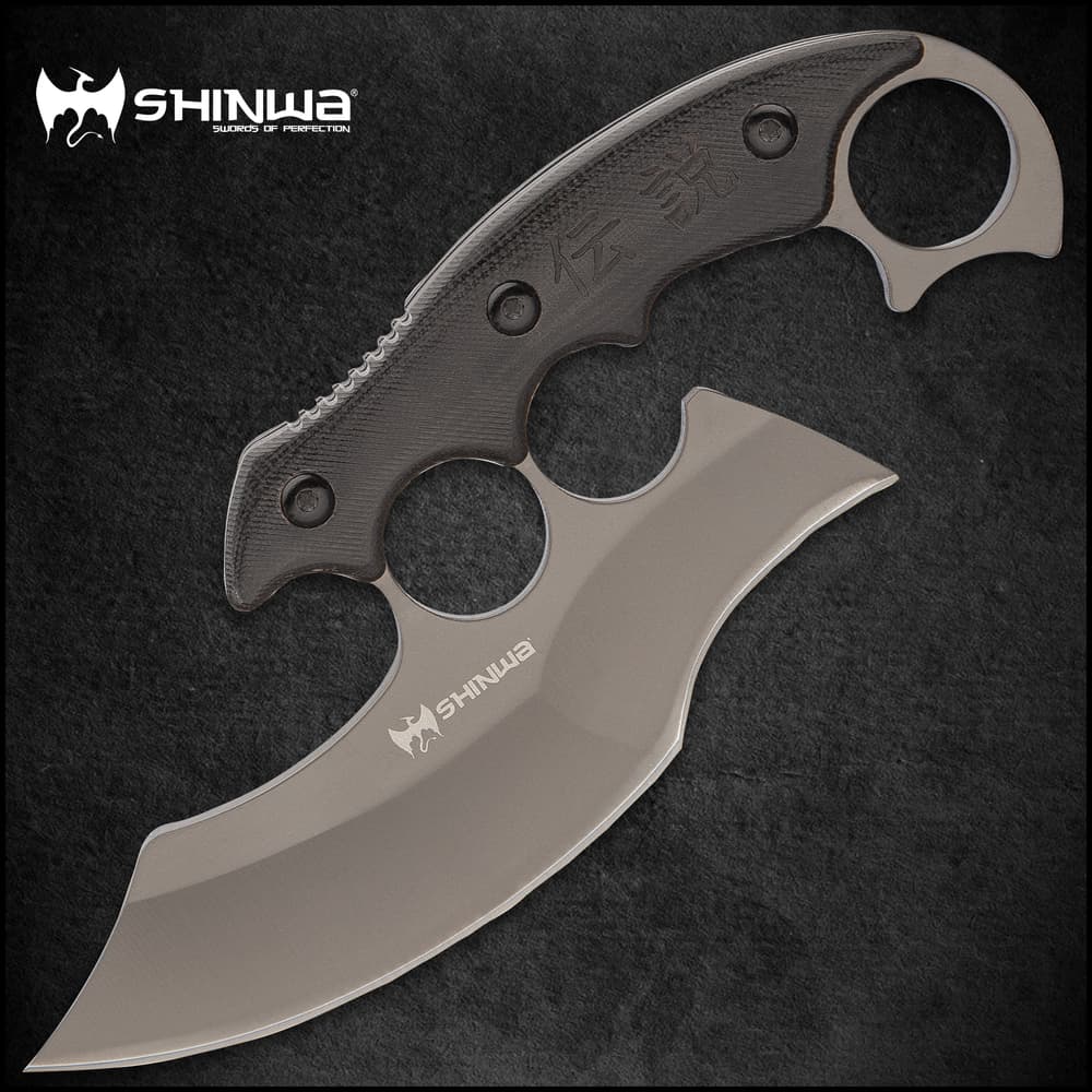 A uniquely designed fixed blade, which combines elements from the traditional karambit and ulu knife, along with a modified knuckle guard image number 0